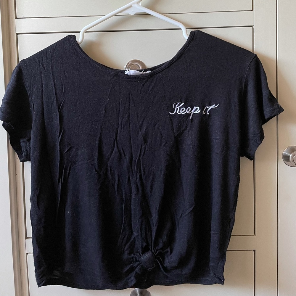 Black shirt that reads: “ Keep It “